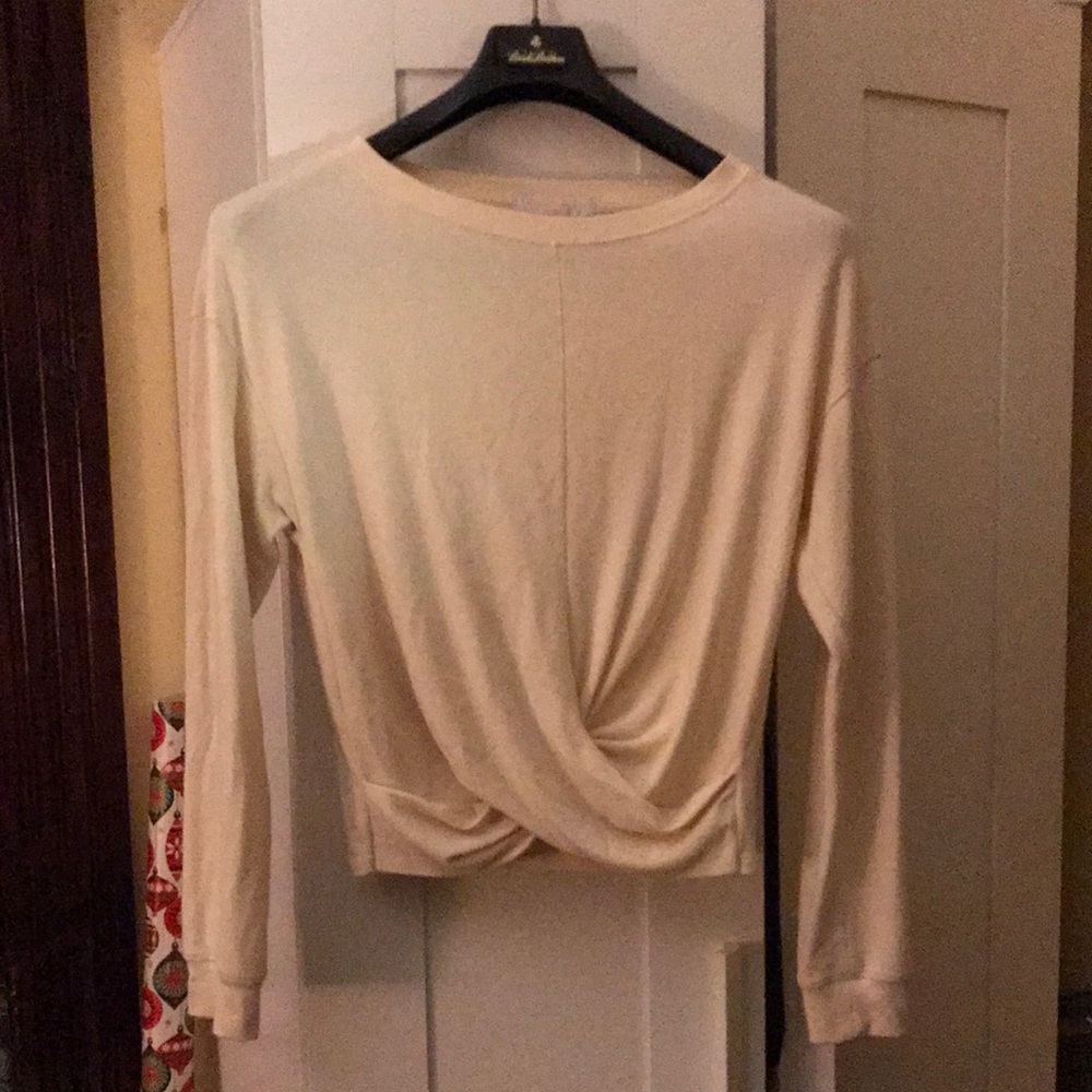 Casual-elegant cream top from Spiritual Gangster, perfect shape